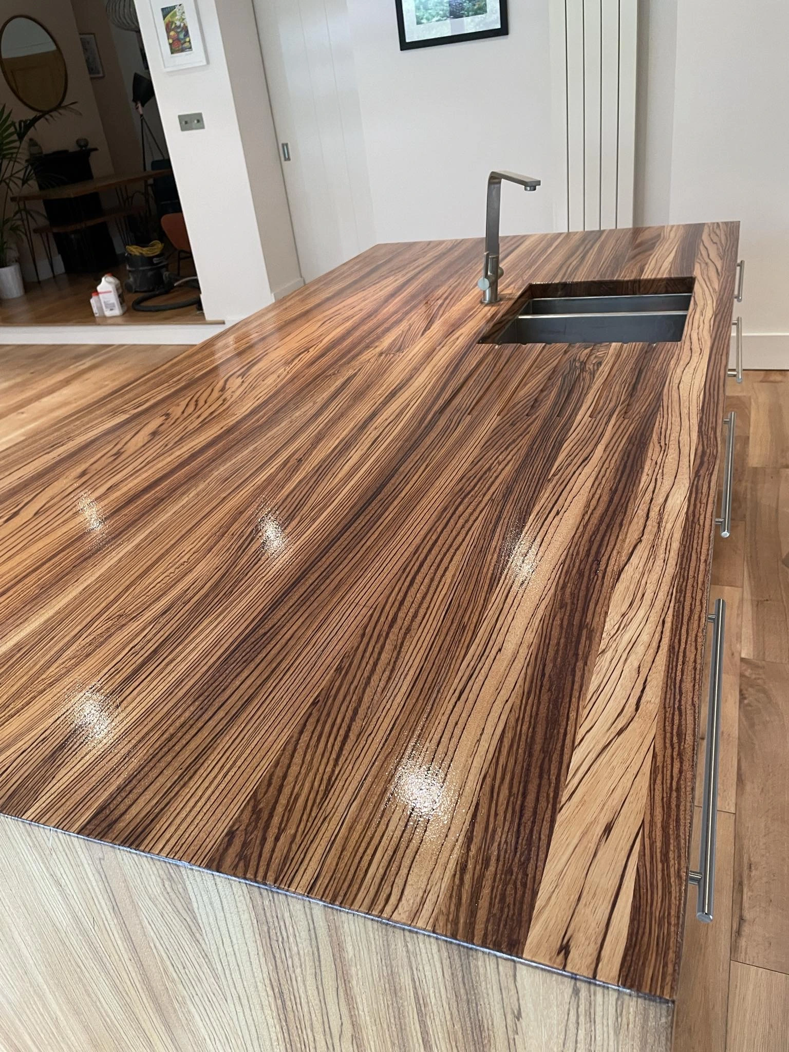 A wooden kitchen island sanded & stained.