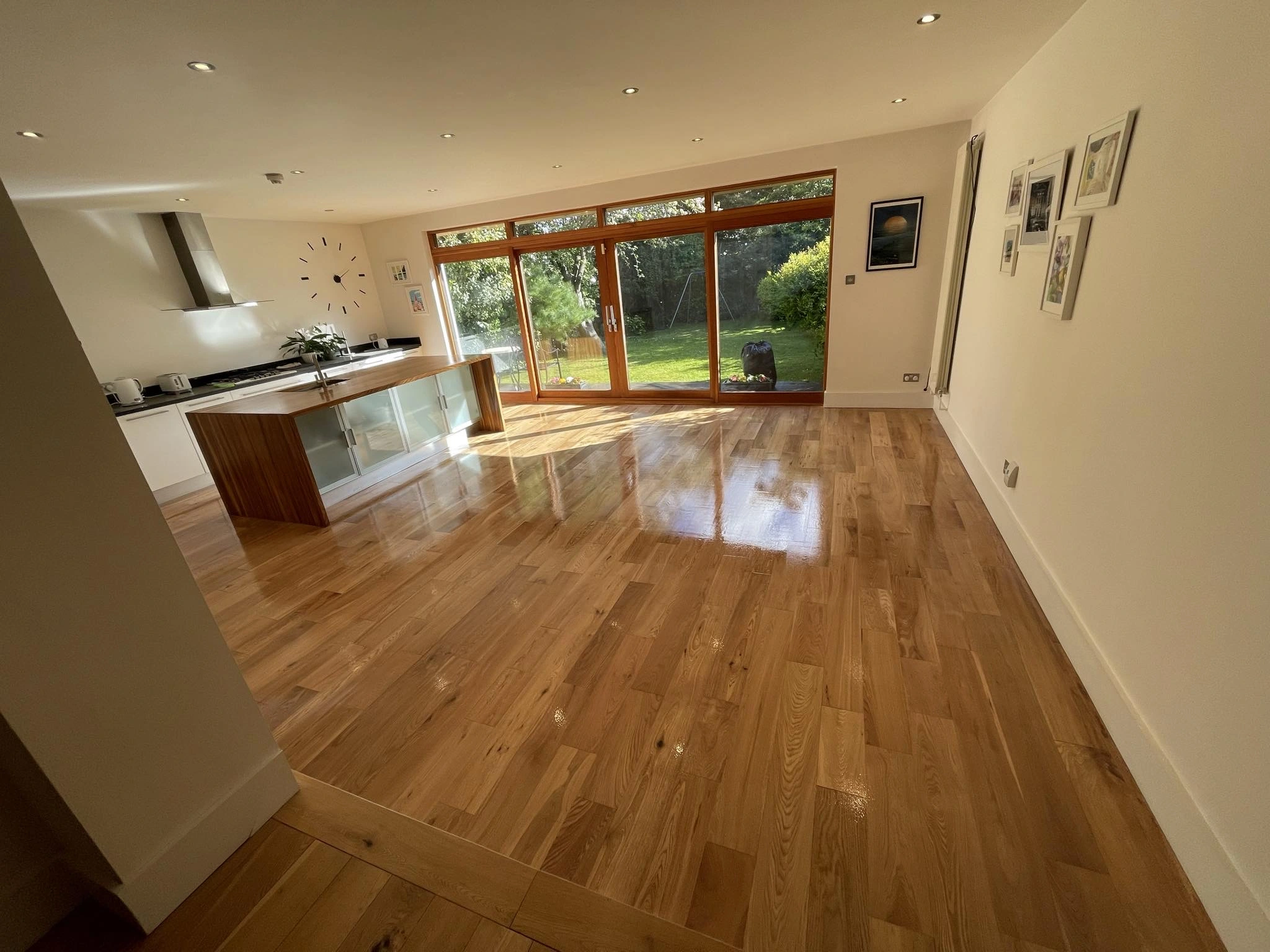 The same kitchen but with the floor sanded & stained with a light coat.