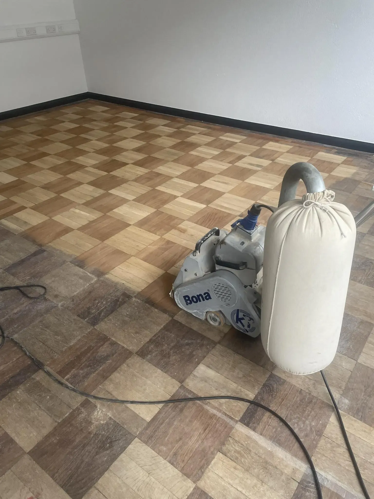 A floor in the process of sanding