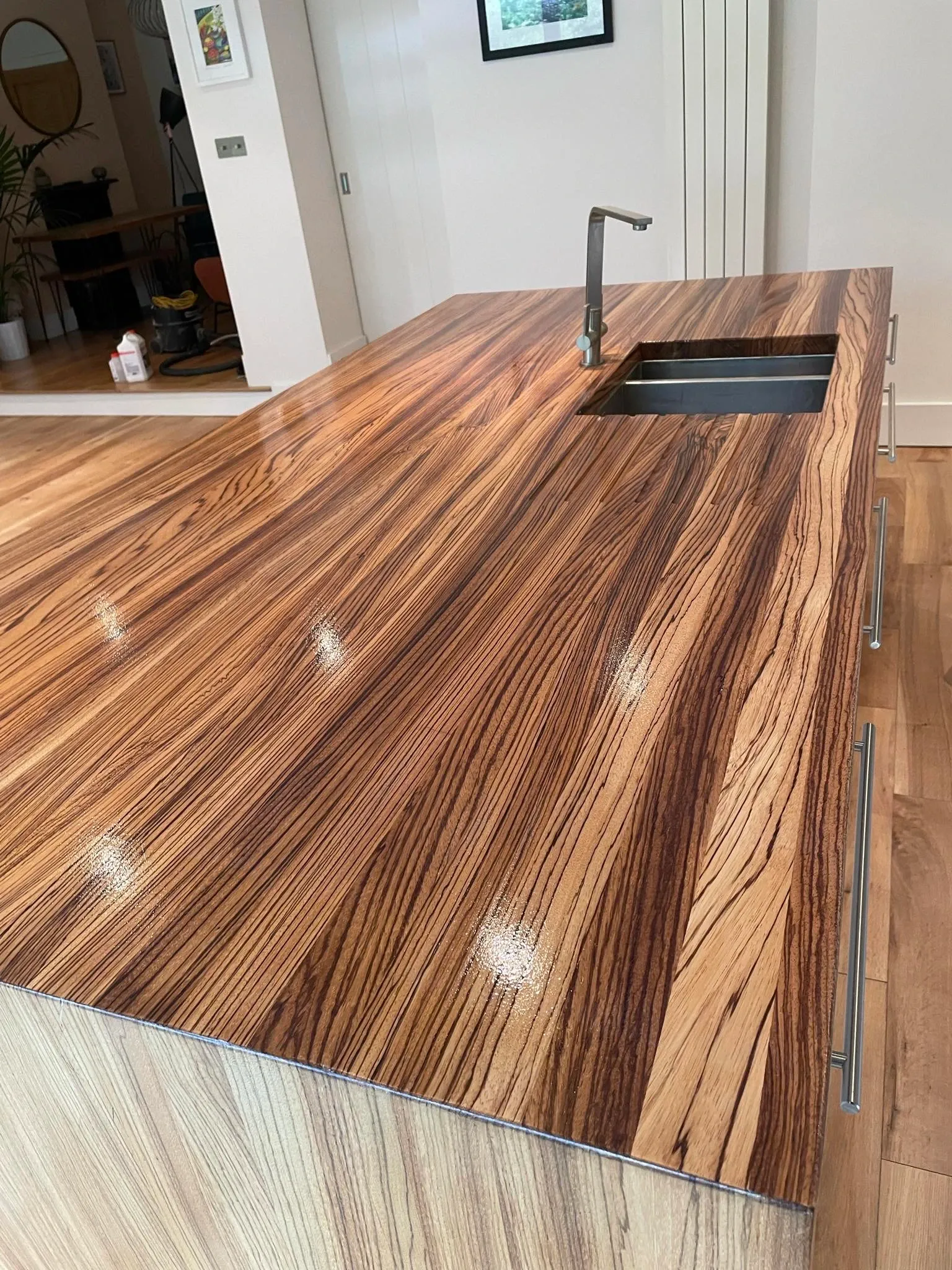 Kitchen's wooden countertop sanded & stained.
