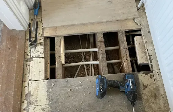 Removing wooden floor from living room