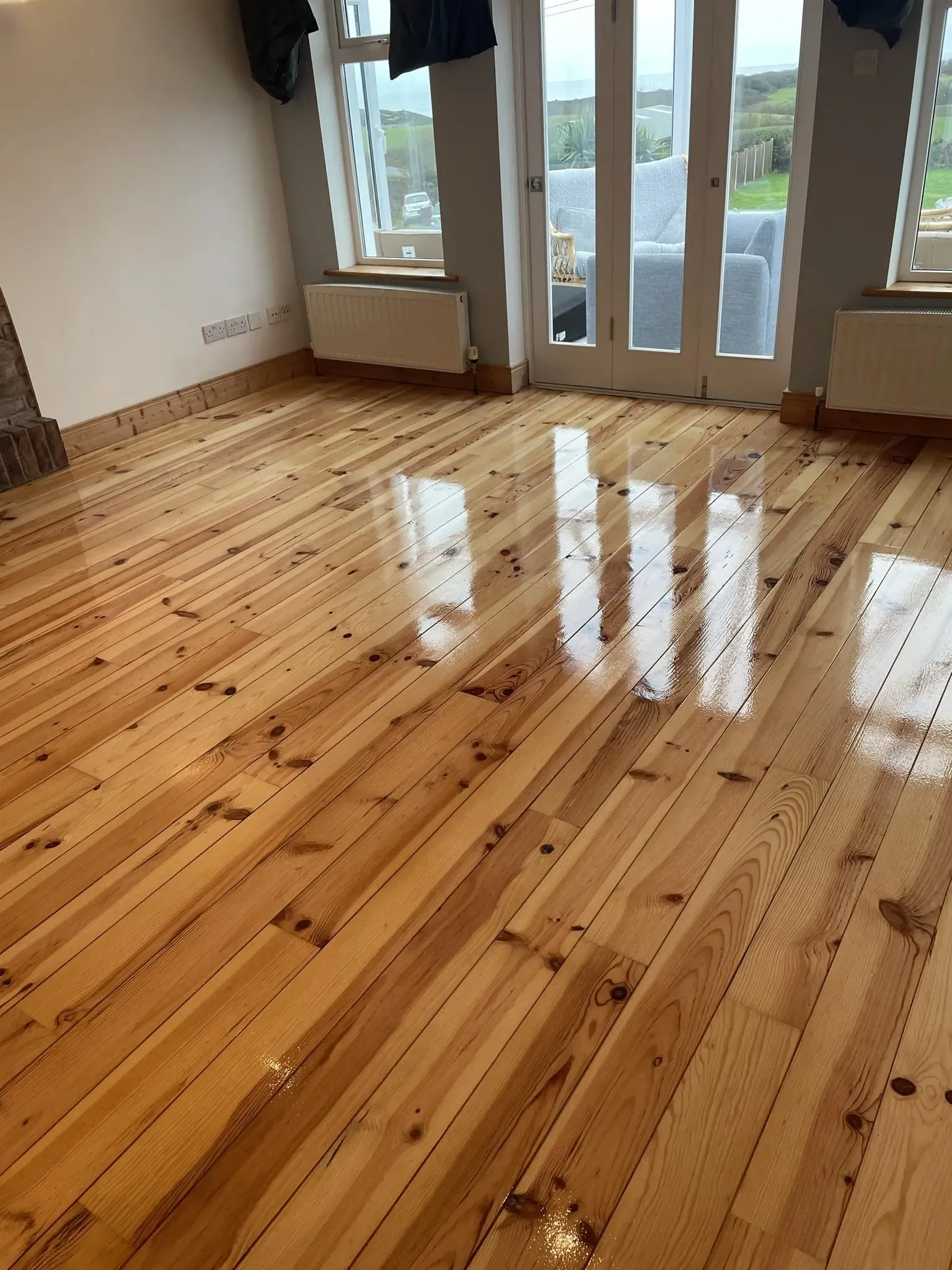 Solid wooden floor sanded & stained